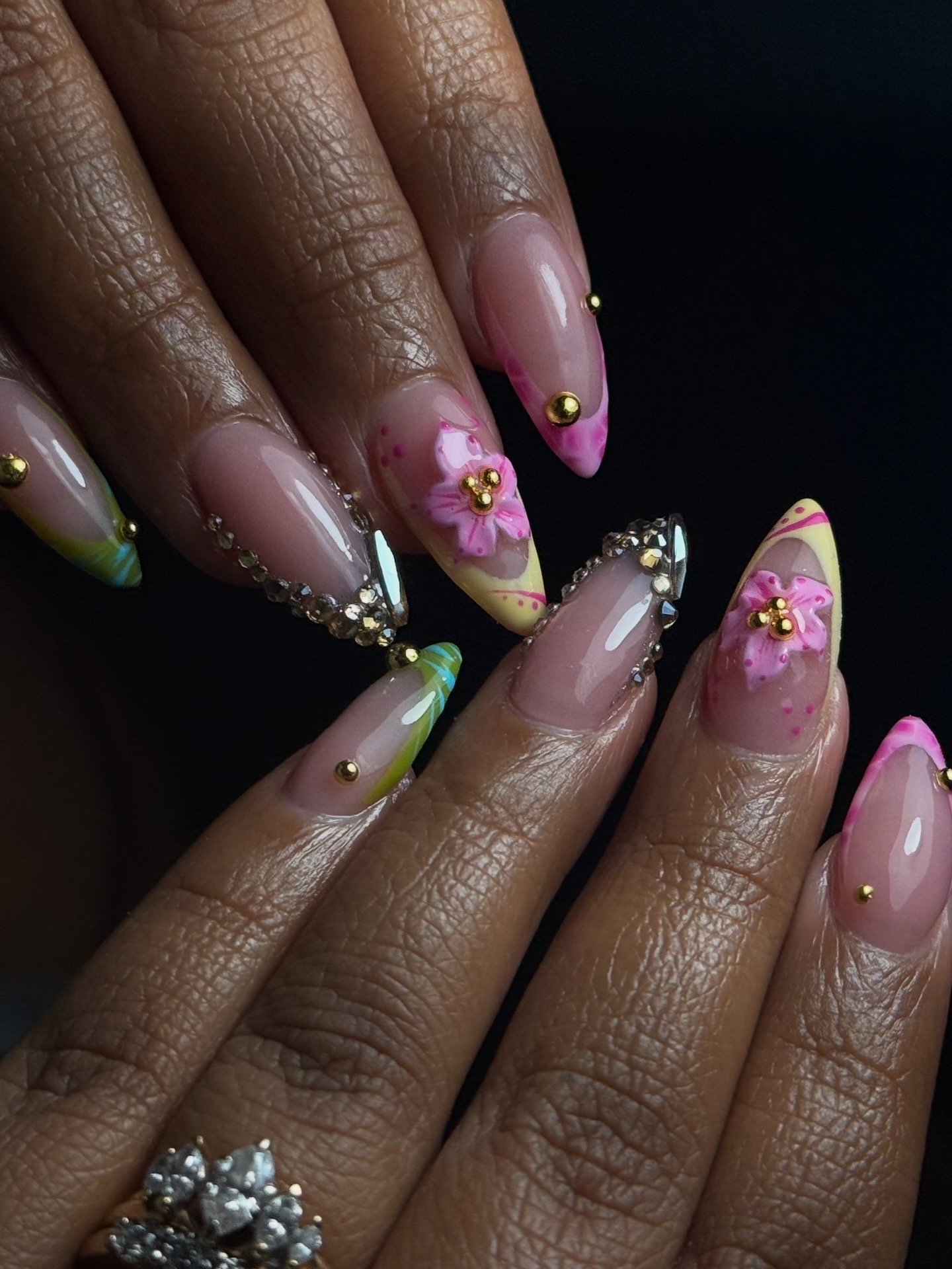 Pink, yellow, and green floral nail set by Purebeyoutybar