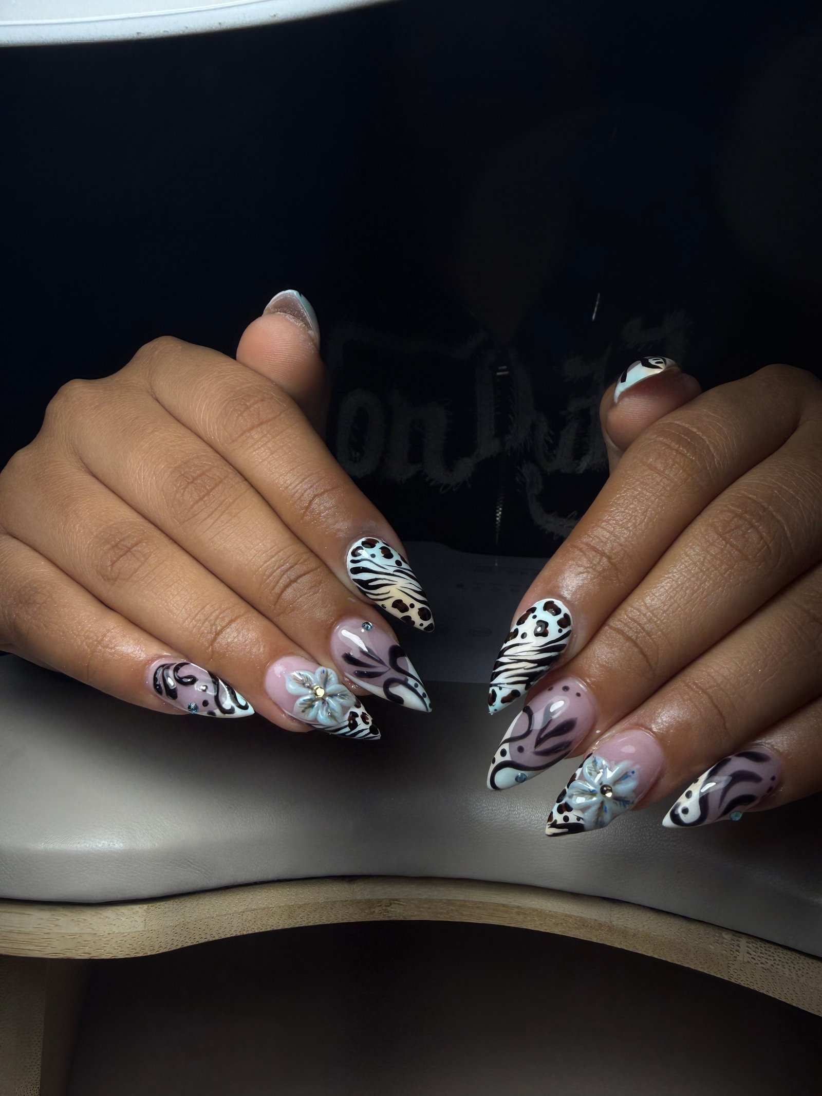 Black and white patterned nail art by Purebeyoutybar
